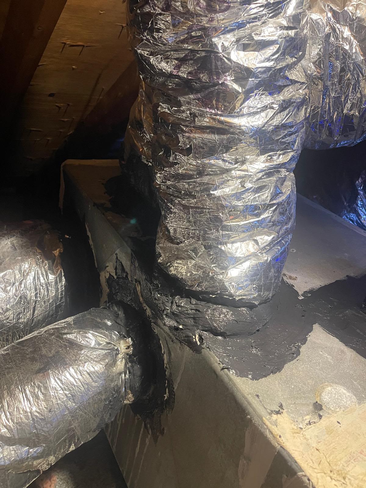 Attic flex duct connections sealed with mastic