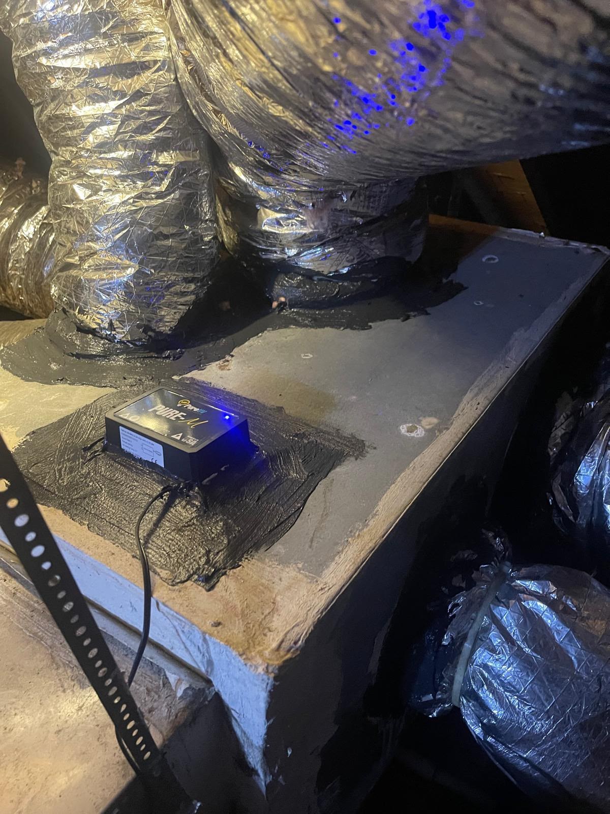 PureUV PURE-M UV light unit installed on the HVAC plenum in Houston TX