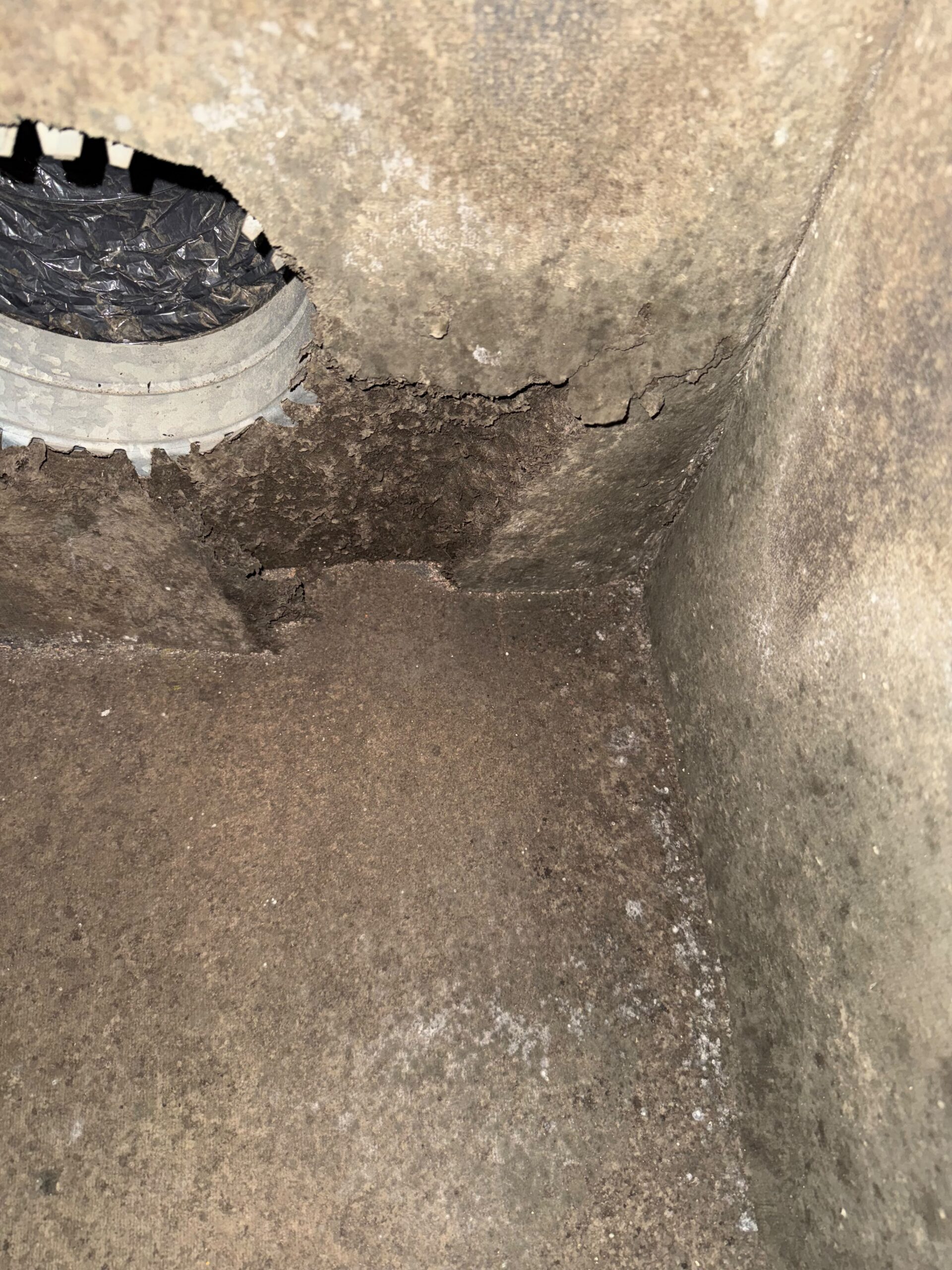 Supply duct collar with debris buildup before cleaning