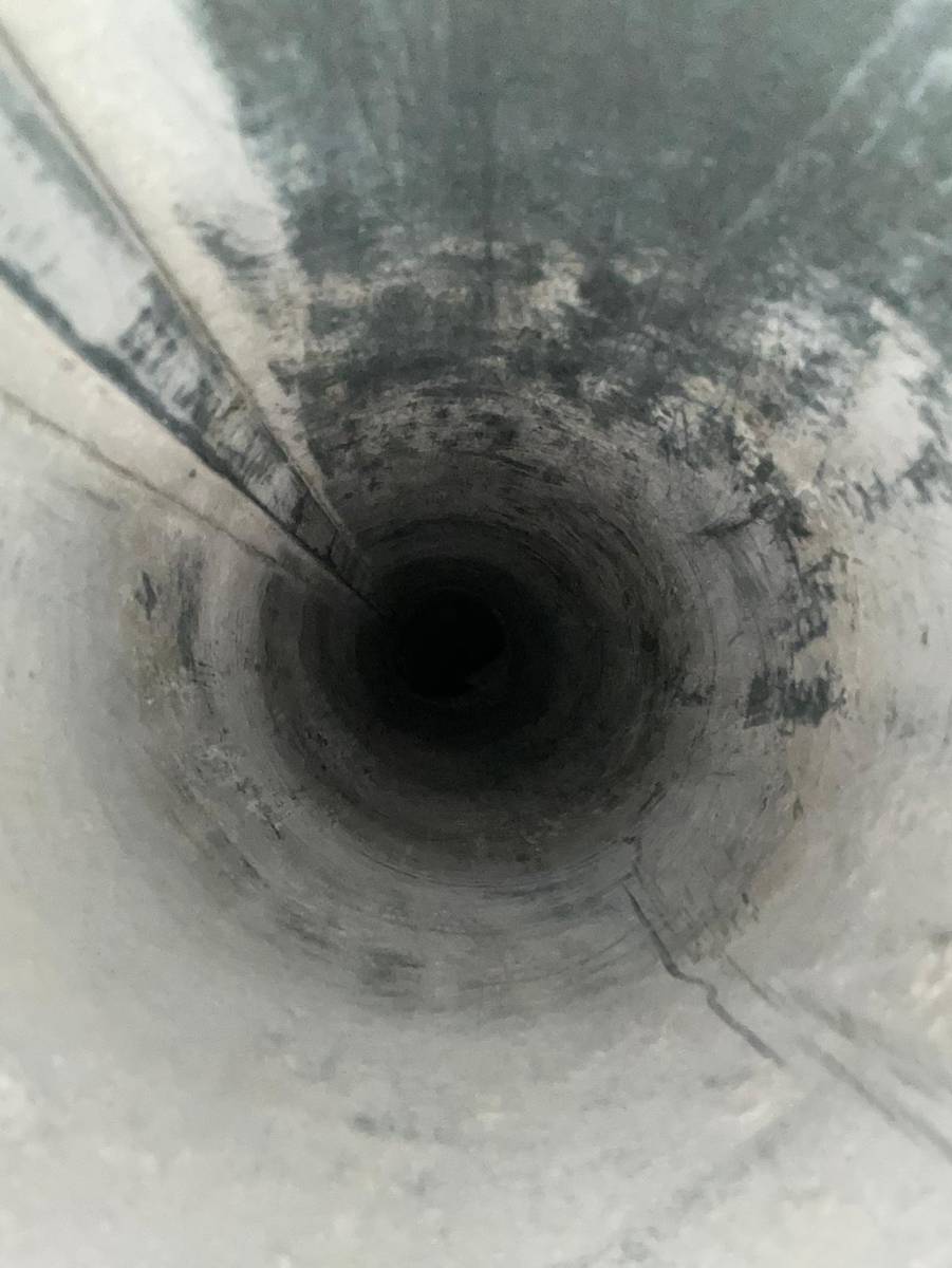 Dryer duct interior coated in lint before cleaning in Richmond TX